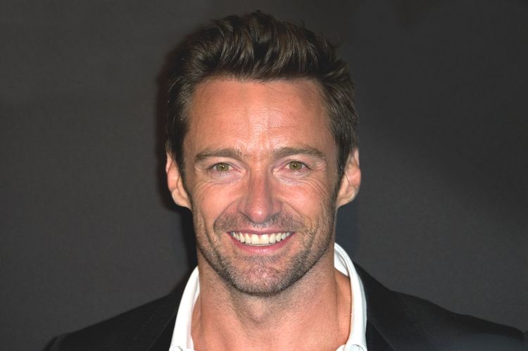 Close up photo of Hugh Jackman smiling