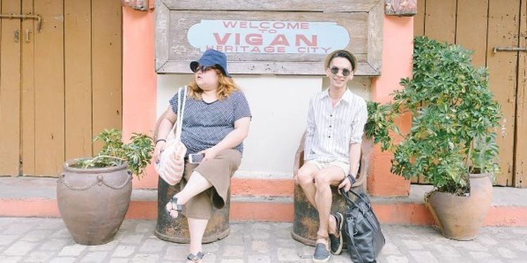 image of two women sitting 