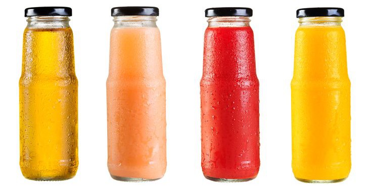 Photo of four Fruit Juices bottles in different colors