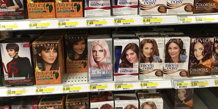 Photo of hair dye boxes on shelf in store