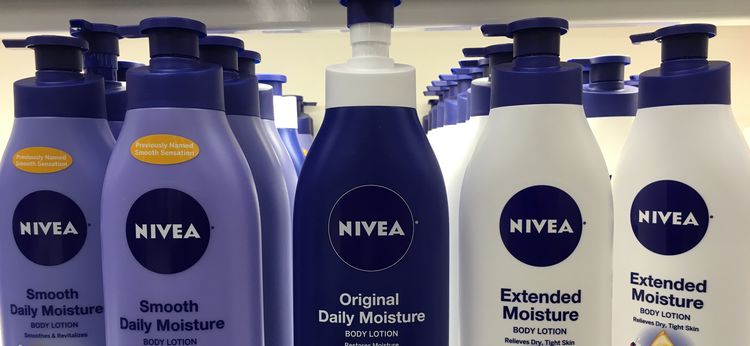 Photo of moisturizer bottles on shelf