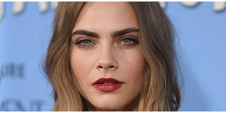 Cara Delevingne with a seductive look in a professional photo