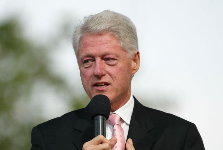 Photo of Bill Clinton, health history of heart surgery, a collapsed lung and more.