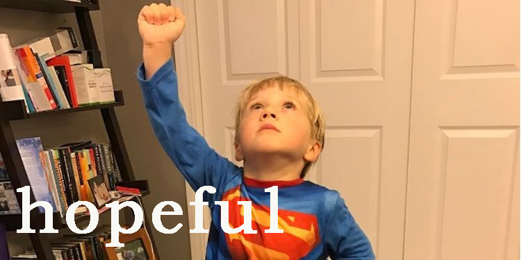 Image of a boy dressed like superman
