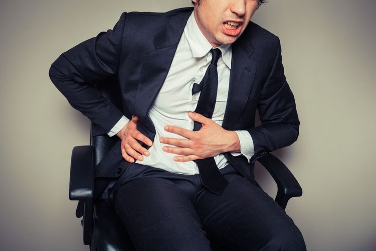 Photo of a man with Stomach Ache