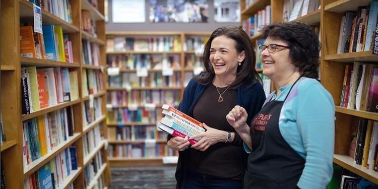 Image of Sheryl Sandberg, a millionaire who shares happiness tips