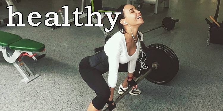 Image of a woman weight lifting