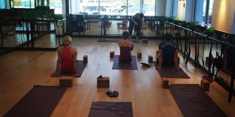 Image of people doing yoga