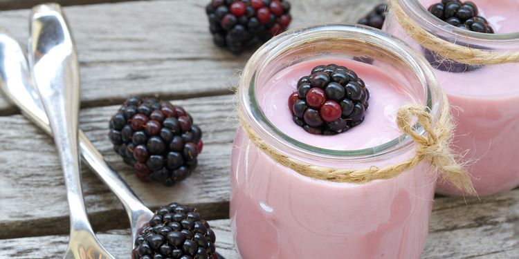 Photo of blackberry yogurt in a jar