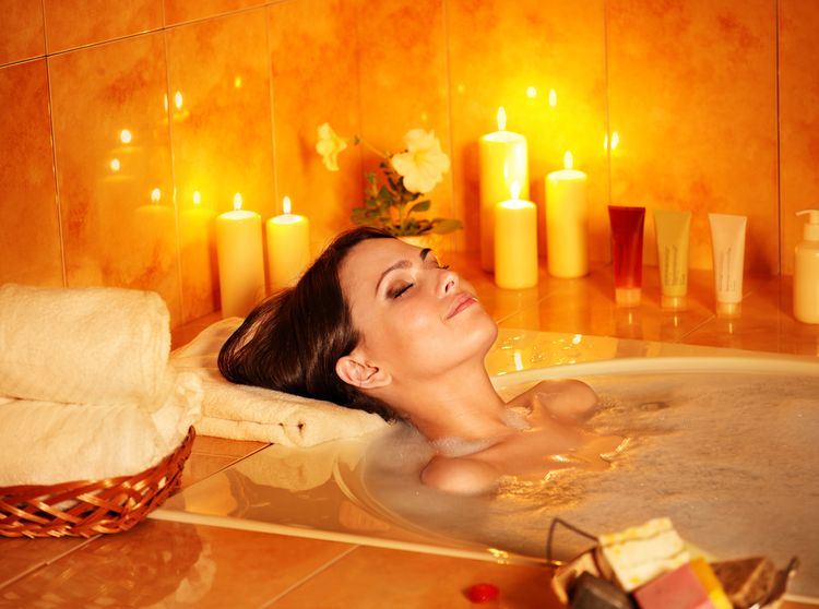 Photo of a Bubble Bath with Candle and Coconut Oil