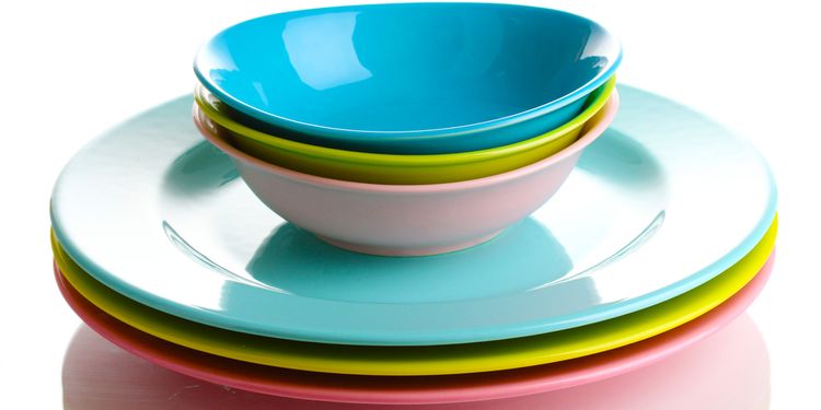 Photo of colorful plates stacked on each other