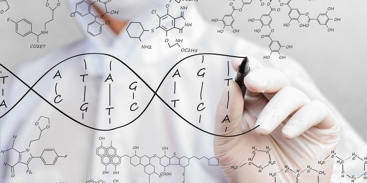 Photo of a Scientist sketching DNA structure