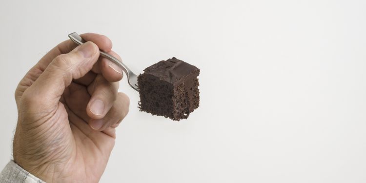 Photo of a chocolate cake on a fork