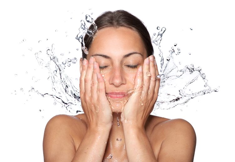 Phot of a girl washing Face With Water Drops