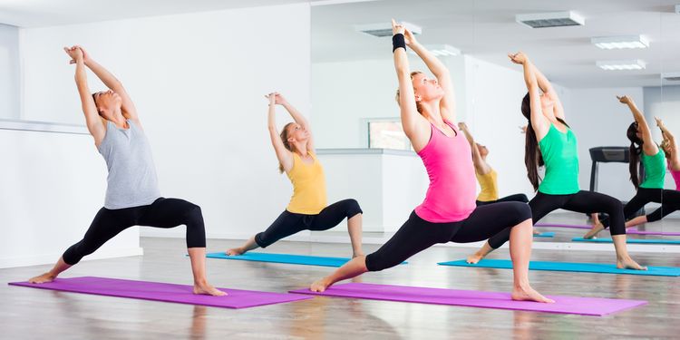 Photo of a women practicing yoga class