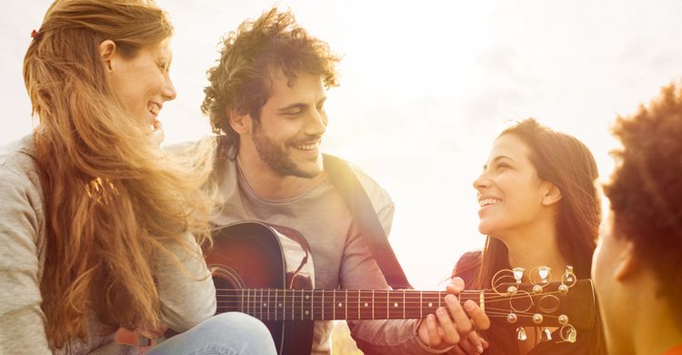 Photo of happy friends smiling