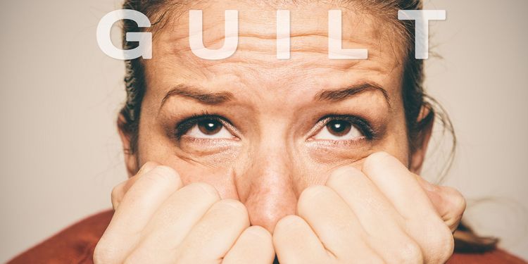 Photo of woman showing signs of guilt