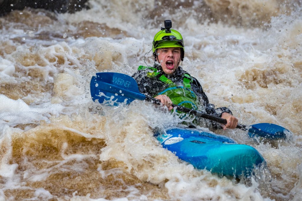 man kayaking