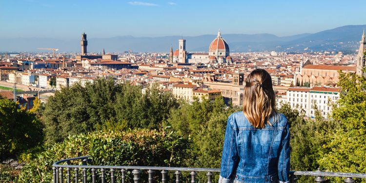 Photo of a girl staring at the skyline of Florence