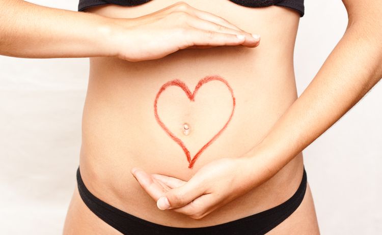 Photo of a heart drawn on a stomach