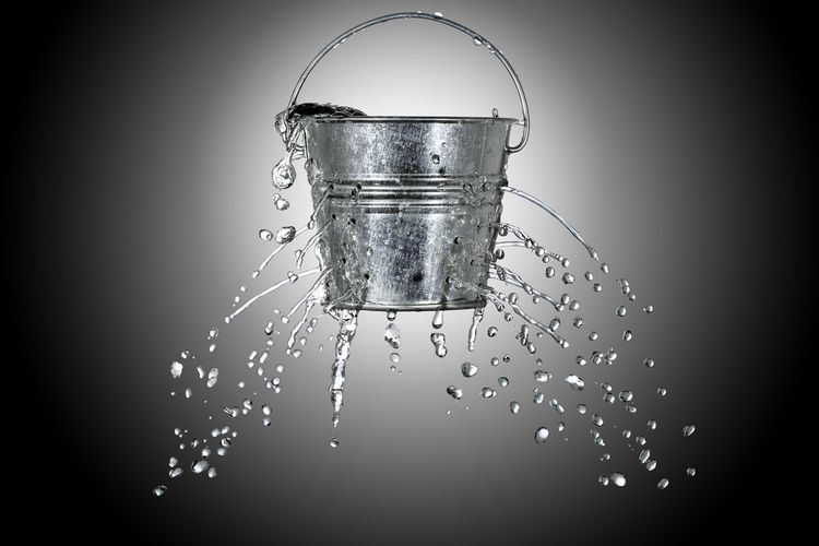 Photo of Leaky Bucket symbolizing Intestinal Permeability