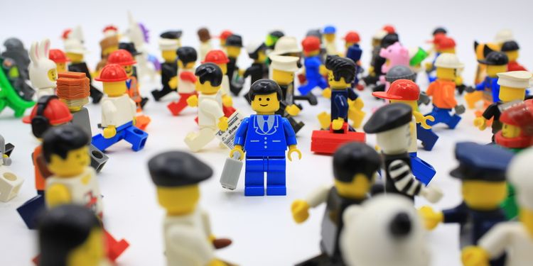 Photo showing lego figures representing lonely individual lost in busy crowd