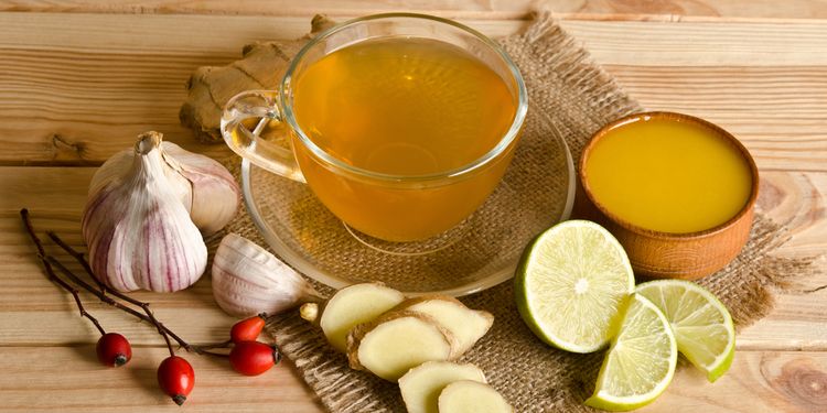 Photo of garlic with lemon and tea