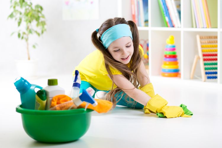 Photo Of a Little Girl Cleaning