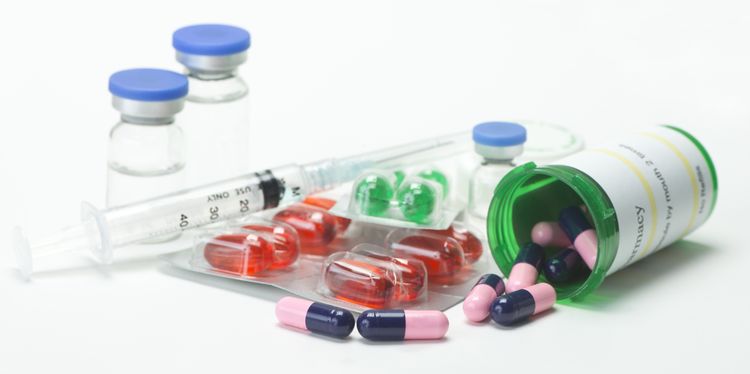 Photo of medications and pills on table