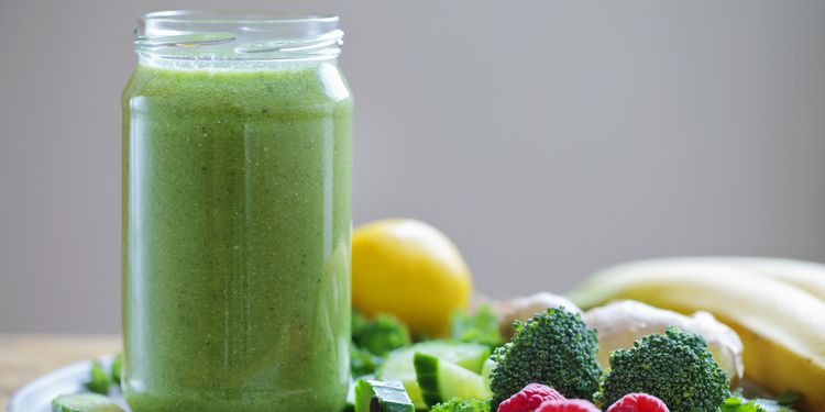 Photo of pumpkin pie green smoothie in a glass jar