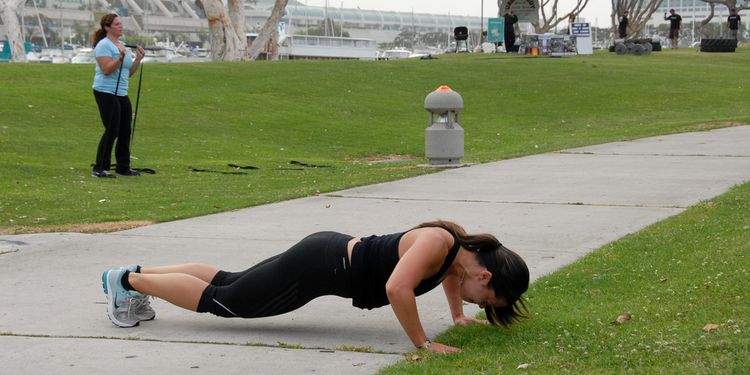 Photo of a women doing workout outdoors