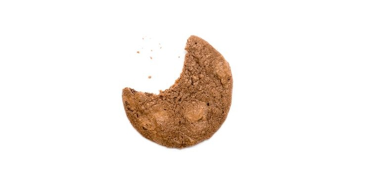 Photo of a cookie with one bite less