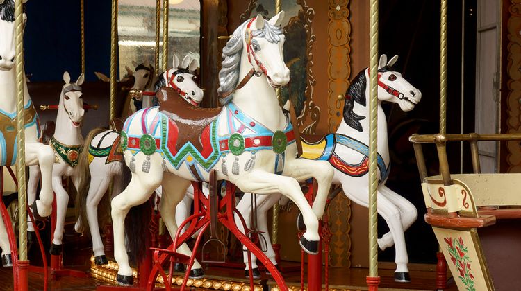 Photo of horses spinning wheel in lunapark