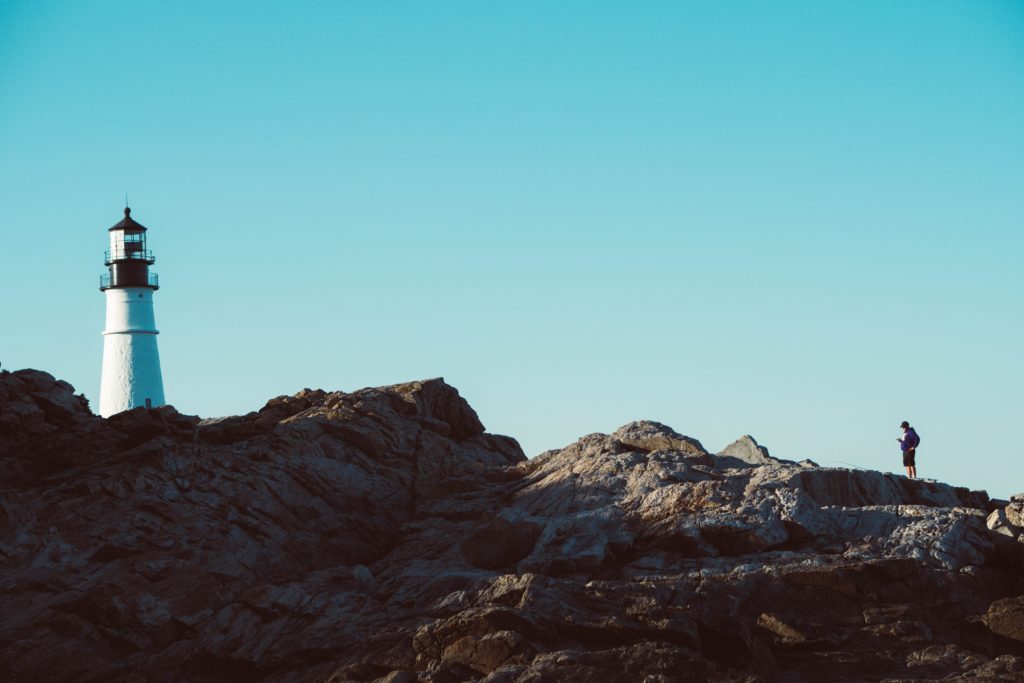 standing by lighthouse