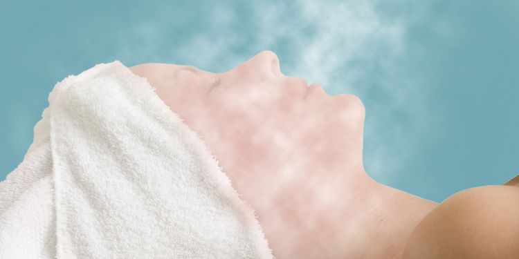 Photo of woman having steam therapy for acne