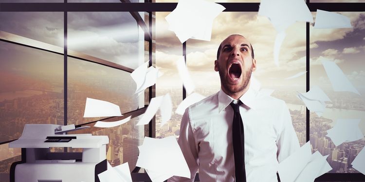 Photo of stressed man in office screaming