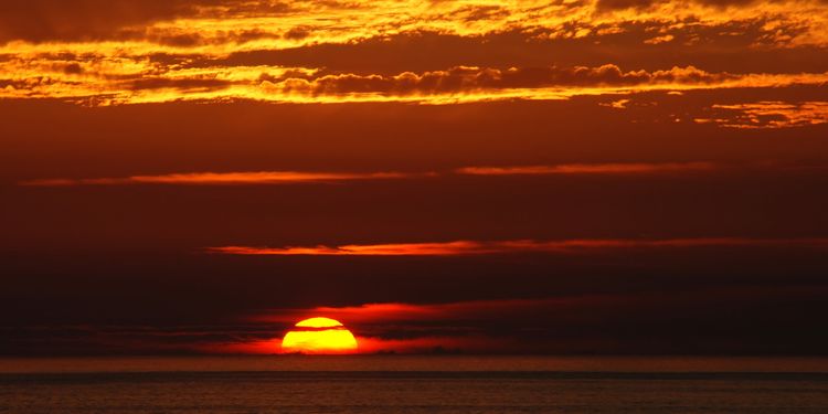 Photo of a sunset at Porto Covo, west coast of Portugal