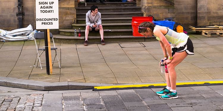 Photo of an exhausted marathon runner